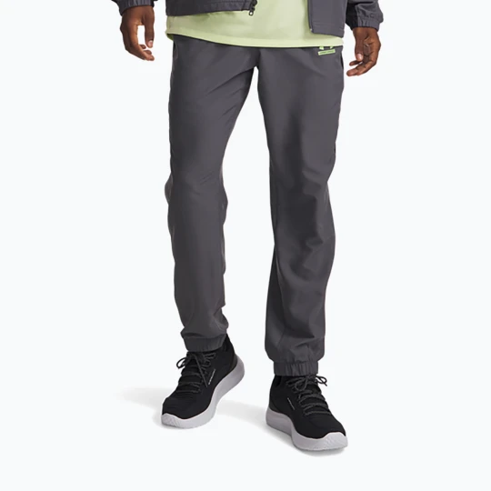 Zdjęcie produktu Spodnie męskie Under Armour Tech Sport castlerock / black / lumos lime Szary