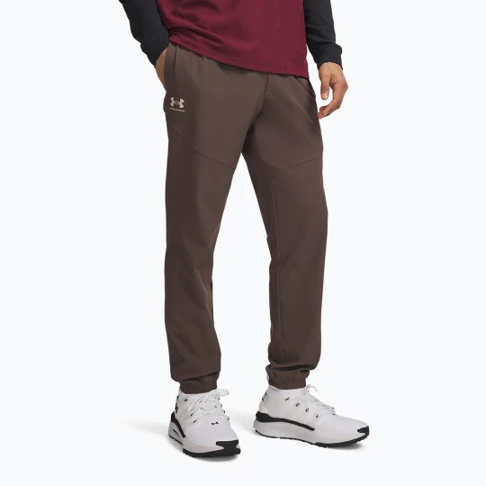 Zdjęcie produktu Spodnie męskie Under Armour Vibe Woven Jogger peppercorn / highland buff Brązowy