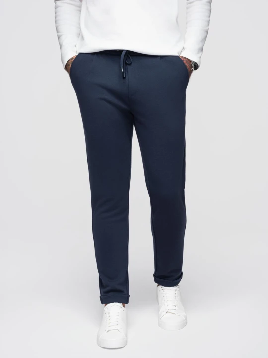 Zdjęcie produktu Spodnie męskie z dzianiny pique z regulacją w pasie – granatowe V1 - Rozmiar: XL Ombre Clothing
