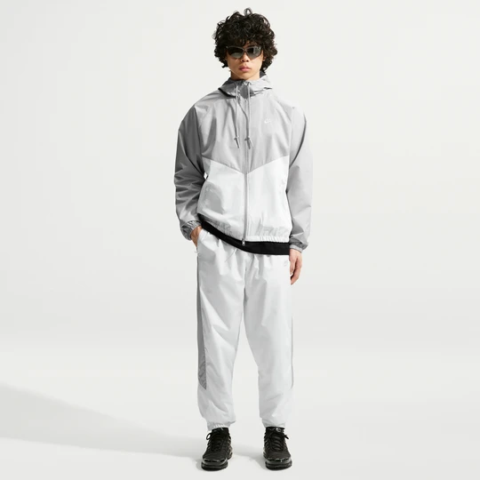 Zdjęcie produktu Spodnie męskie z podszewką Nike Windrunner - Biel
