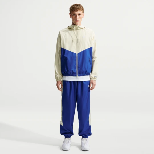 Zdjęcie produktu Spodnie męskie z podszewką Nike Windrunner - Niebieski