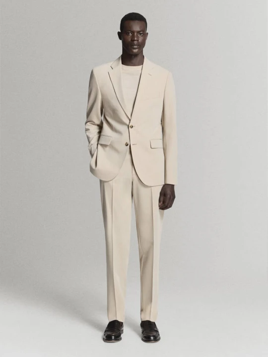 Zdjęcie produktu Spodnie garniturowe Milan slim fit beżowy - Mężczyzna - - MANGO MAN