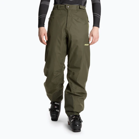 Zdjęcie produktu Spodnie narciarskie męskie Oakley Tc Camber Rc Shell Pant new dark brush Zielony