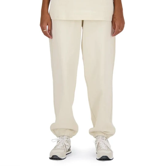 Zdjęcie produktu Spodnie damskie New Balance WP41513LIN - beżowe