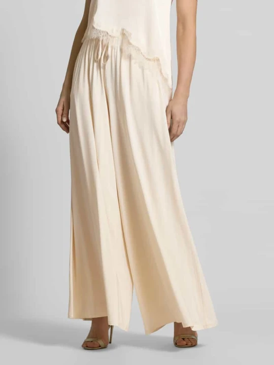 Zdjęcie produktu spodnie o kroju loose fit o szerokości z mieszanki wiskozy model 'FULMINE' MAX&Co. Écru