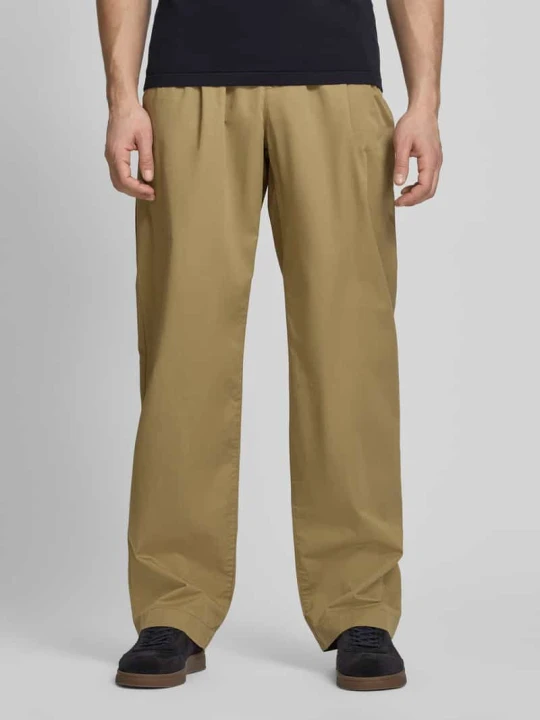 Zdjęcie produktu Spodnie o kroju loose fit z zakładkami w pasie Tommy Hilfiger Gliniany