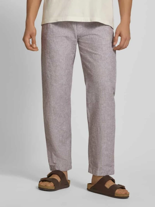 Zdjęcie produktu Spodnie o kroju regular fit o szerokości z mieszanki lnu i bawełny Tommy Jeans Jasnoszary