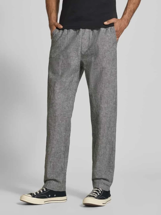 Zdjęcie produktu Spodnie o kroju regular fit o szerokości z mieszanki lnu i bawełny Tommy Jeans Zielony