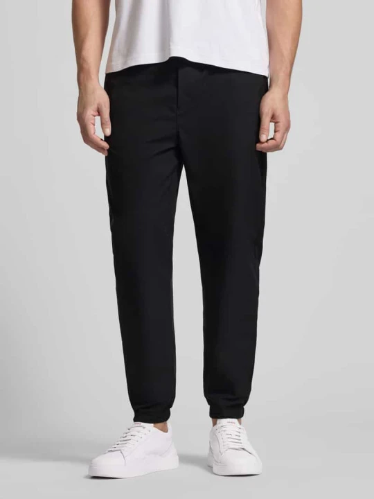 Zdjęcie produktu Spodnie o kroju slim fit o luźnym kroju z kieszeń z tyłu Calvin Klein Czarny
