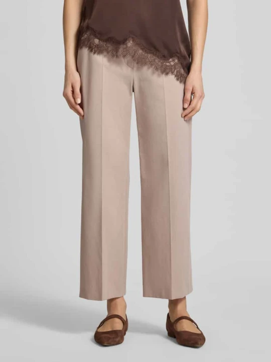 Zdjęcie produktu Spodnie o kroju slim fit z kantami Windsor Brudnoróżowy