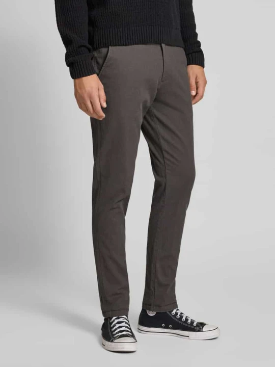 Zdjęcie produktu Spodnie o kroju slim fit z wpuszczanymi kieszeniami model ‘MARCO’ Jack&Jones Średnioszary