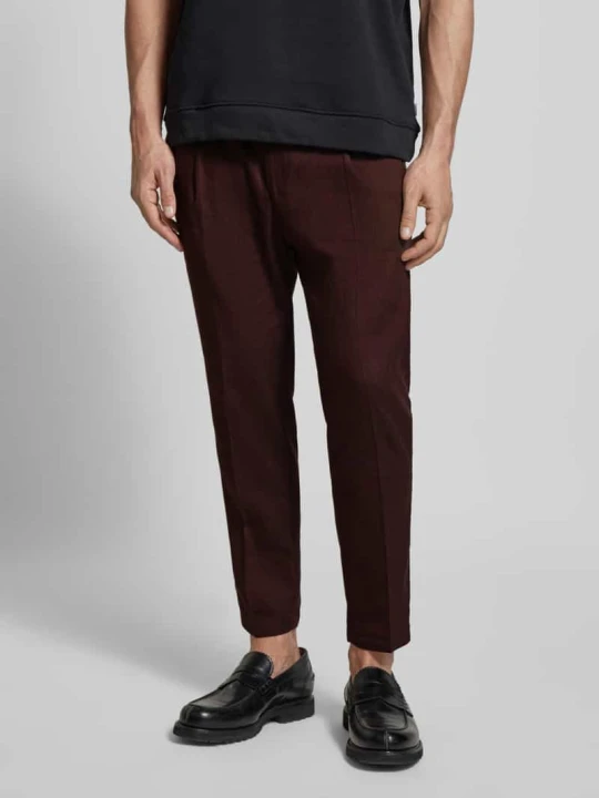 Zdjęcie produktu Spodnie o kroju tapered fit z zakładkami w pasie i elastycznym pasem model ‘CHASY’ Drykorn
