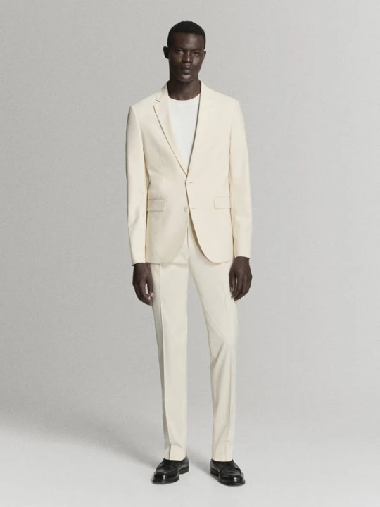 Zdjęcie produktu Spodnie garniturowe París super slim fit kremowy / écru - Mężczyzna - - MANGO MAN beżowy