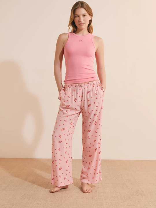 Zdjęcie produktu Spodnie od piżamy 7 / 8 w pomidorowy wzór, z kokardkami po bokach Etam rose pale