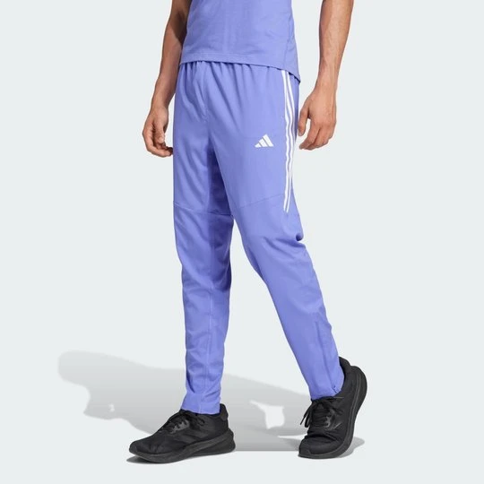 Zdjęcie produktu Spodnie Own the Run 3-Stripes Adidas Semi Cobalt Blue