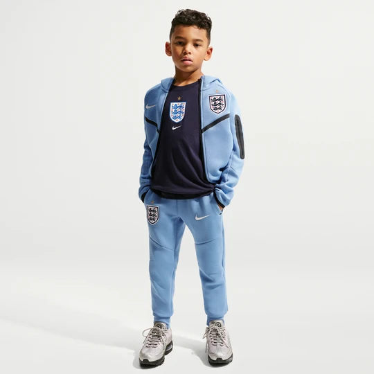 Zdjęcie produktu Spodnie piłkarskie dla dużych dzieci (chłopców) Nike Anglia Tech Fleece - Niebieski