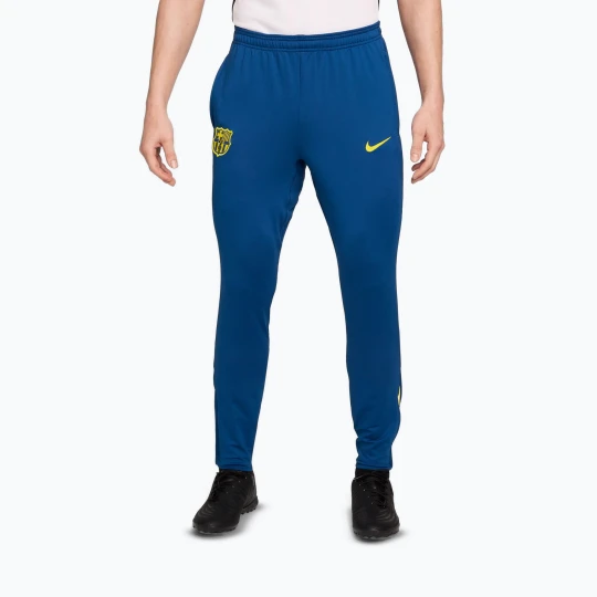 Zdjęcie produktu Spodnie piłkarskie męskie Nike FC Barcelona Strike SE gym blue / opti yellow
