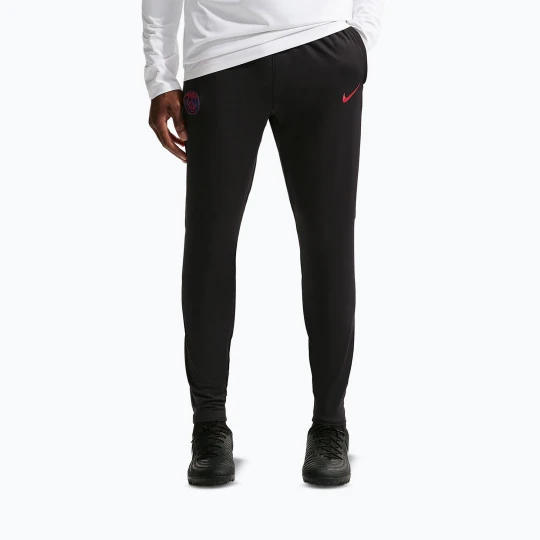 Zdjęcie produktu Spodnie piłkarskie męskie Nike Paris Saint-Germain Strike Dri-Fit black/global red/global red