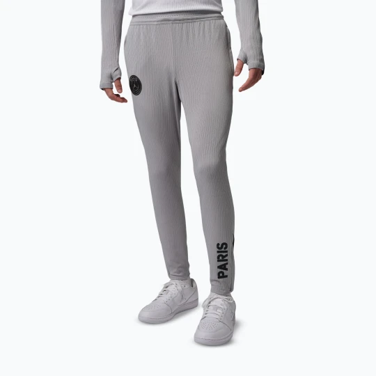 Zdjęcie produktu Spodnie piłkarskie męskie Nike Paris Saint-Germain Strike Elite Fourth atmosphere grey / black
