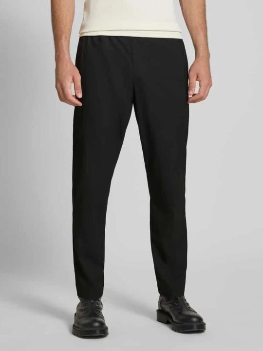 Zdjęcie produktu Spodnie sportowe o kroju relaxed fit z elastycznym pasem Jack&Jones czarny