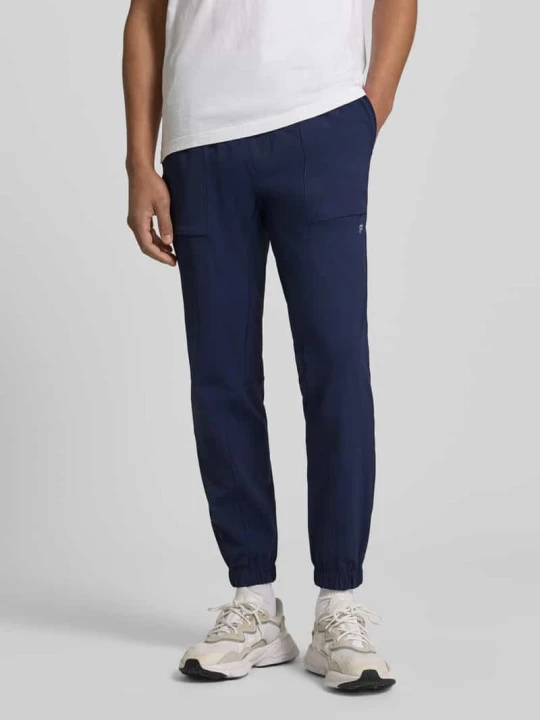 Zdjęcie produktu Jogger o kroju slim fit z elastycznym pasem Fabletics Ciemnoniebieski