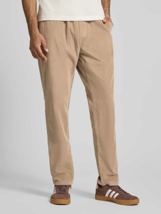 Zdjęcie produktu Spodnie sztruksowe o kroju tapered fit z czystej bawełny model ‘ISAAC’ Tommy Jeans Beżowy