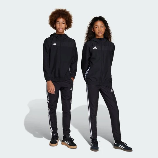 Zdjęcie produktu Spodnie Tiro 25 Essentials Woven Kids Adidas