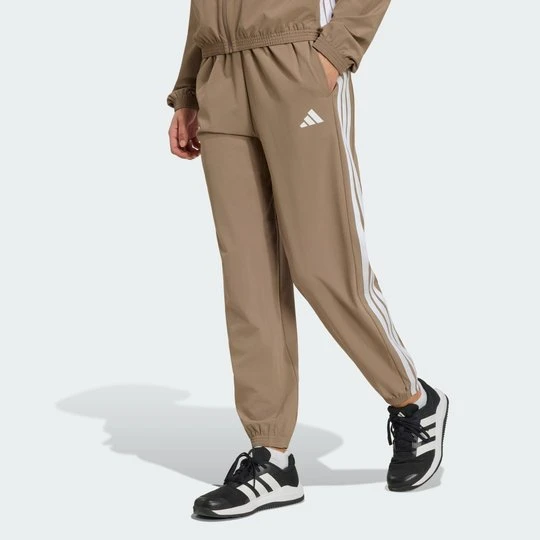 Zdjęcie produktu Spodnie Train Essentials 3-Stripes Woven Adidas Khaki Six
