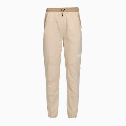 Zdjęcie produktu Spodnie trekkingowe damske The North Face Ma Wind Track granite sand/kelp tan Beżowy