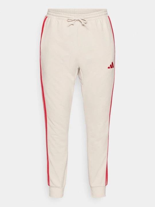 Zdjęcie produktu Spodnie treningowe Adidas beżowy