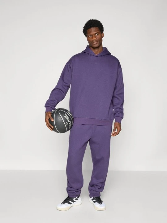 Zdjęcie produktu Spodnie treningowe Adidas bordowy