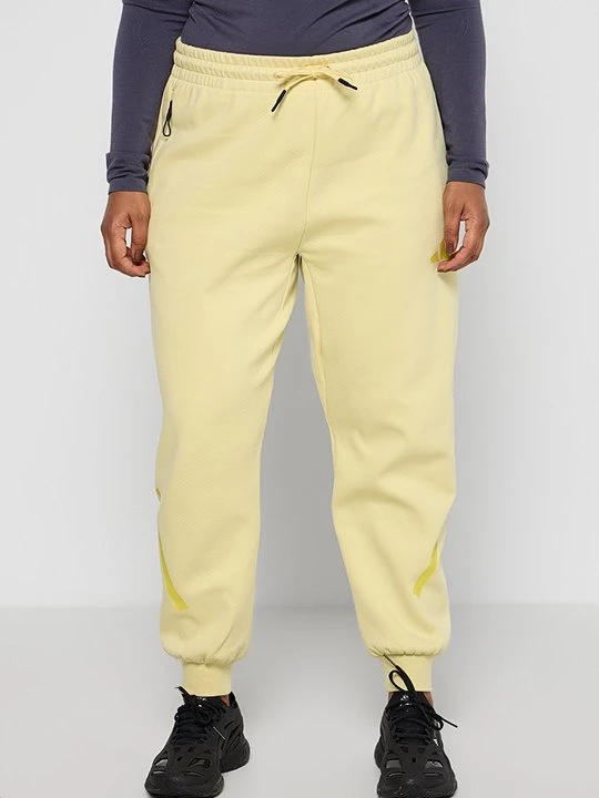 Zdjęcie produktu Spodnie treningowe adidas Originals żółty