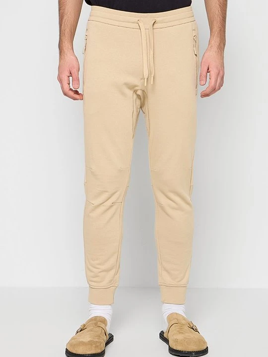 Zdjęcie produktu Spodnie treningowe Armani Exchange szafirowy