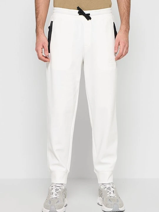 Zdjęcie produktu Spodnie treningowe Armani Exchange biały