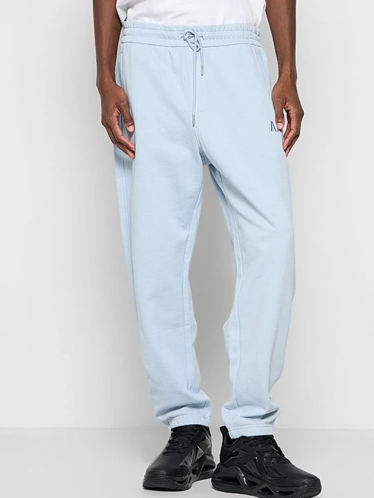 Zdjęcie produktu Spodnie treningowe Armani Exchange jasnoniebieski