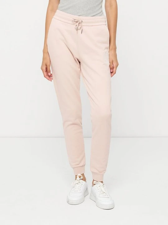 Zdjęcie produktu Spodnie treningowe Armani Exchange jasnoróżowy