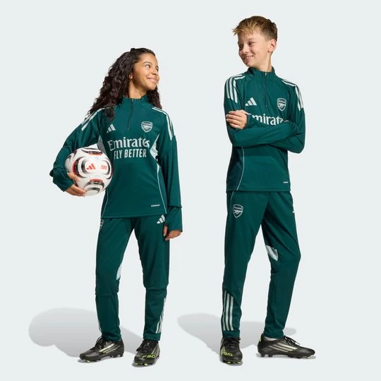 Zdjęcie produktu Spodnie treningowe Arsenal Tiro 25 Competition Adidas Aurora Ivy