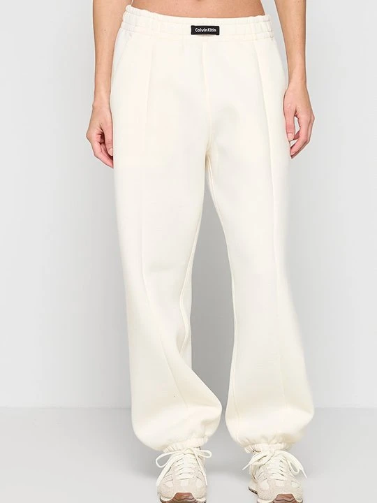 Zdjęcie produktu Spodnie treningowe Calvin Klein jasnożółty