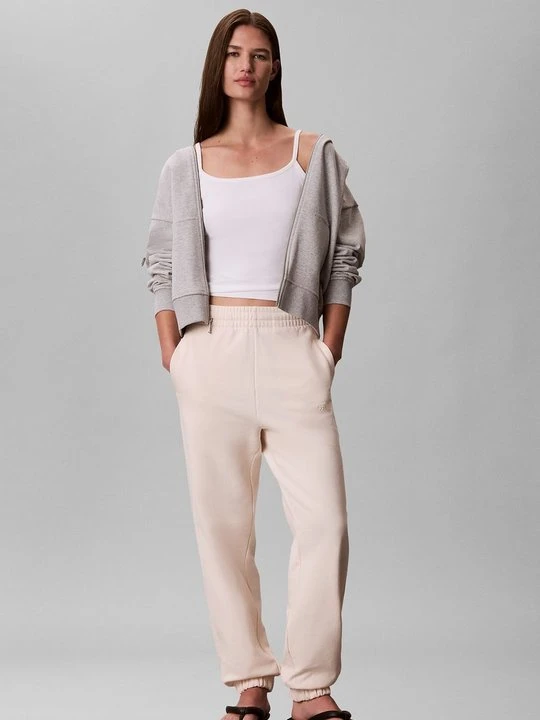 Zdjęcie produktu Spodnie treningowe Calvin Klein beżowy
