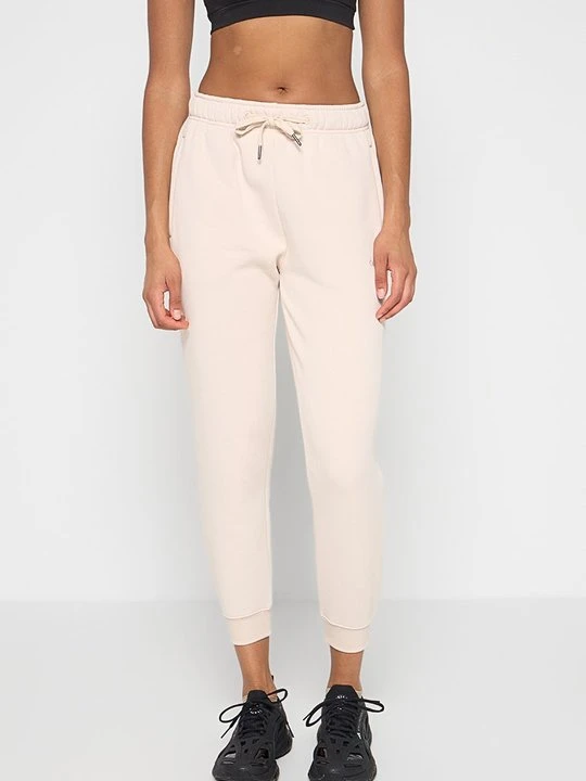 Zdjęcie produktu Spodnie treningowe Calvin Klein beżowy