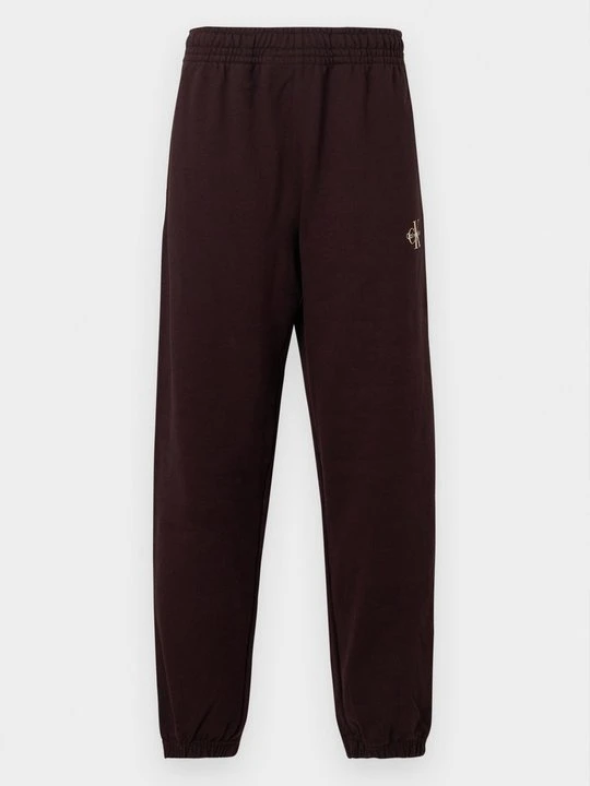 Zdjęcie produktu Spodnie treningowe Calvin Klein Jeans ciemnobrązowy