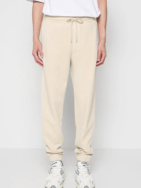 Zdjęcie produktu Spodnie treningowe Calvin Klein Jeans beżowy
