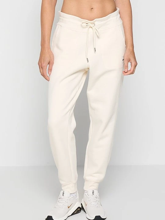 Zdjęcie produktu Spodnie treningowe DKNY mleczny