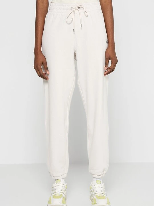 Zdjęcie produktu Spodnie treningowe DKNY mleczny