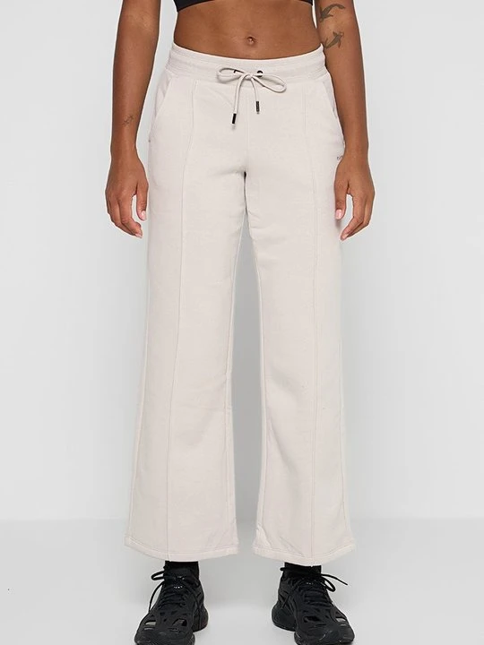 Zdjęcie produktu Spodnie treningowe DKNY mleczny