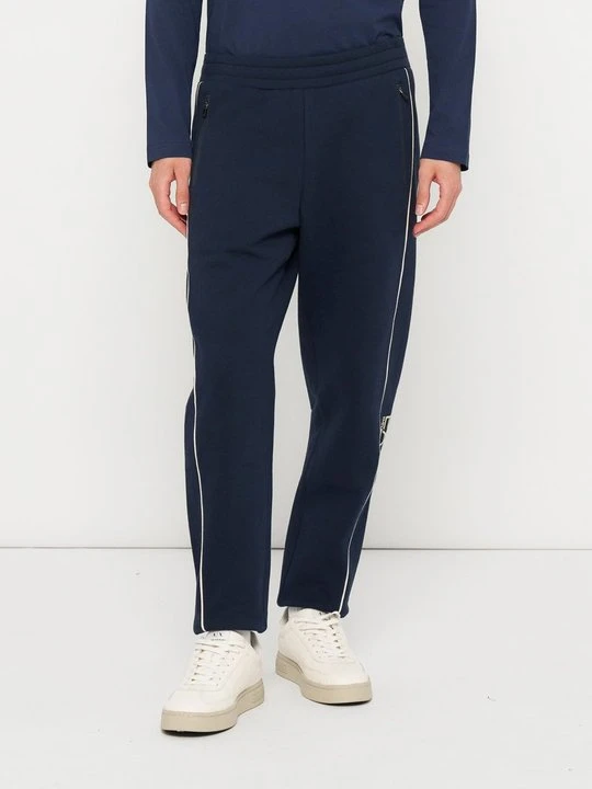 Zdjęcie produktu Spodnie treningowe EA7 Emporio Armani granatowy