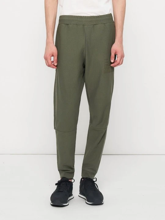 Zdjęcie produktu Spodnie treningowe EA7 Emporio Armani jasnozielony