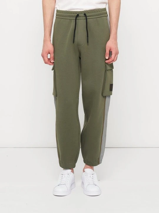 Zdjęcie produktu Spodnie treningowe EA7 Emporio Armani jasnozielony