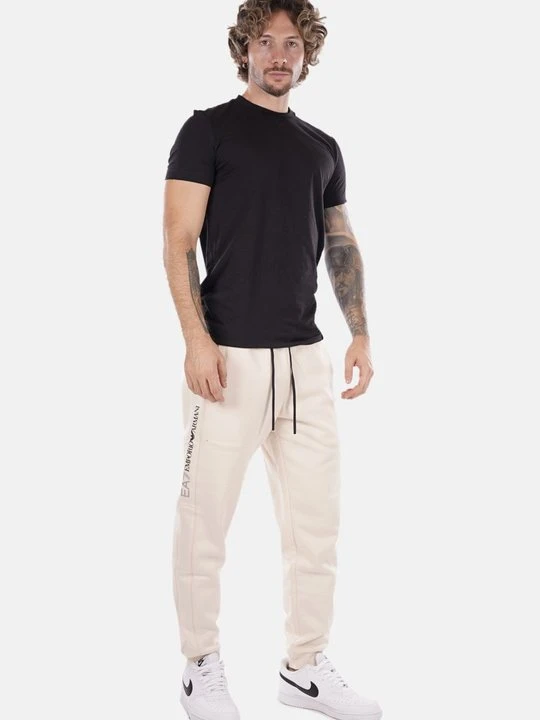 Zdjęcie produktu Spodnie treningowe EA7 Emporio Armani mleczny