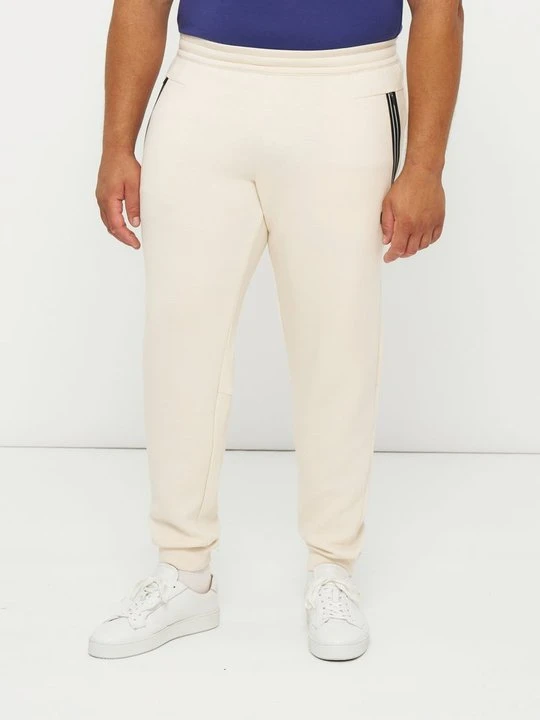 Zdjęcie produktu Spodnie treningowe EA7 Emporio Armani mleczny